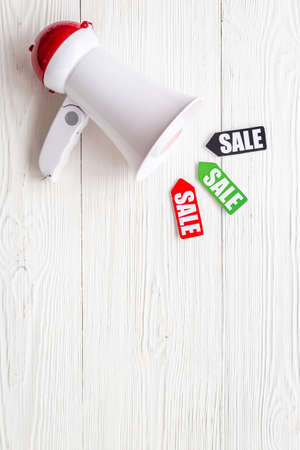 Sales announcement concept with sale labels and megaphoneの写真素材