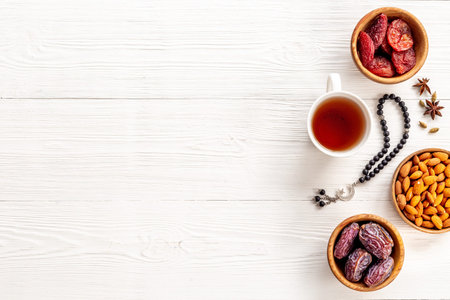 Islamic rosary with dates fruits and tea. Ramadan Kareem conceptの写真素材