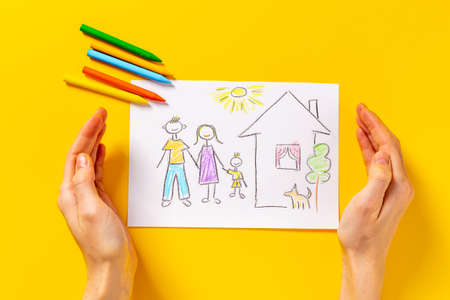 Mortgage concept. Happy family in house - Children drawingの写真素材