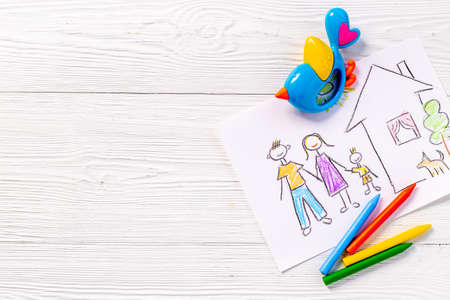 Child picture of family painted with colored pencilsの写真素材