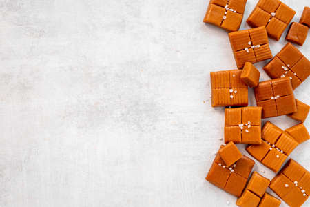 Homemade caramel pieces with salt. Candies backgroundの写真素材