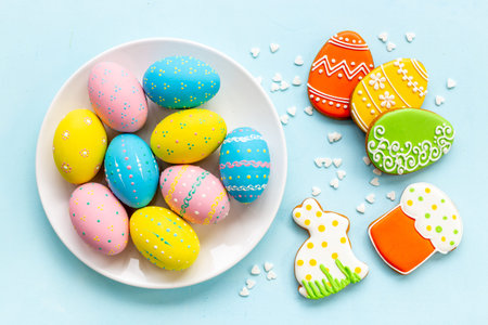 Easter Bunny cookies with eggs top view. Happy Easter background