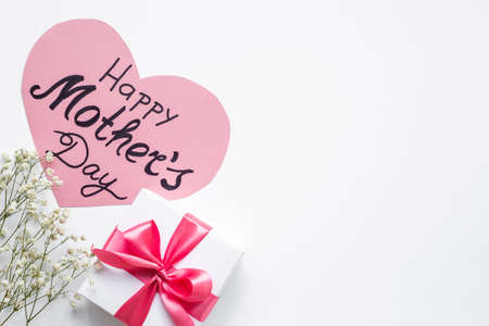 Women mothers day concept with pink ribbon fift boxの写真素材