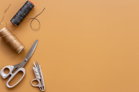Fashion designer or seamstress table with tailor toolsの写真素材