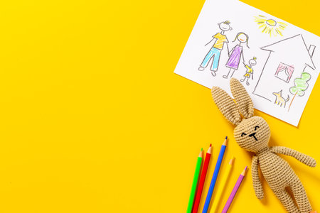 Childs drawing of happy family. Adoption conceptの写真素材