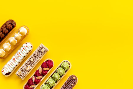 Eclairs with pistachio raspberries and chocolate cream topping