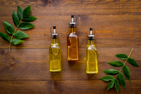 Bottles of different types cooking oil. Sunflower olive and sesame oil