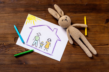 Mortgage concept. Happy family in house - Childrens drawing