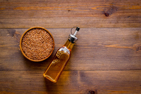 Sesame cooking oil in bottle with seeds. Cooking oil backgroundの写真素材
