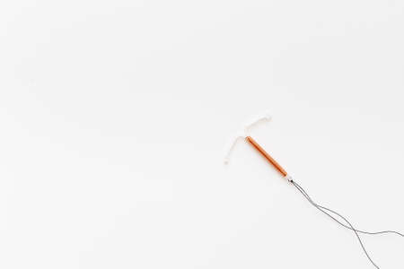 T-shaped intrauterine contraceptive device. Hormone free contraception conceptの写真素材