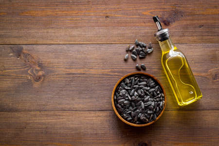 Sunflower oil in bottle with seeds. Cooking oil backgroundの写真素材