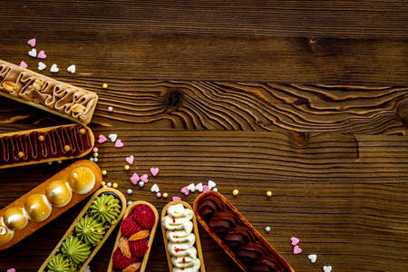 Bakery banner background of eclairs colorful topping