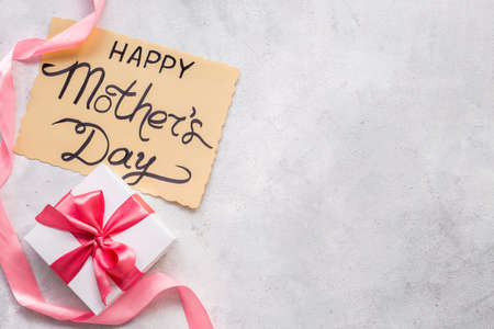 Flatlay of Happy Mothers day greeting card and gift boxの写真素材