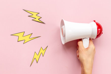 Megaphote with flying out lightning. Hiring or advertising conceptの写真素材