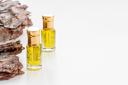 Bottles of agarwood tree oil perfume, close up. Traditional Arabian fragranceの写真素材