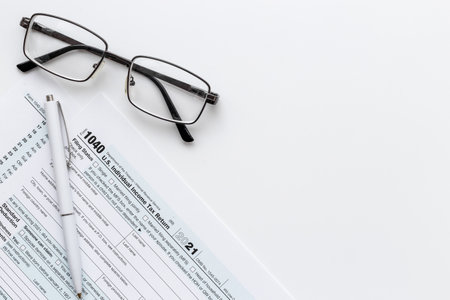 Pen on US individual tax form. Tax payment seasonの写真素材