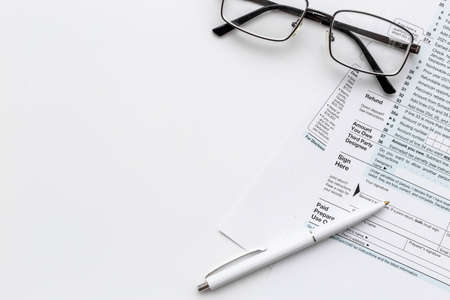 Pen on US individual tax form. Tax payment seasonの写真素材