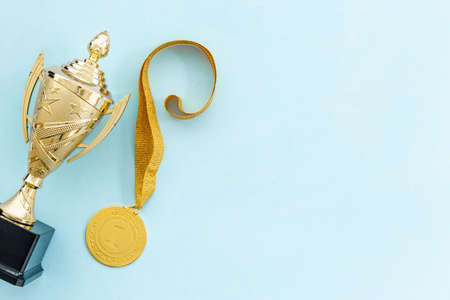 Award trophy cup and gold medal first place. Winner and success conceptの写真素材