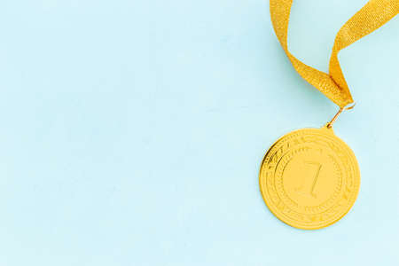 Winner or champion gold trophy - medal first place on ribbonの写真素材