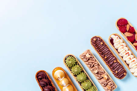 Bakery banner background of eclairs colorful toppingの写真素材