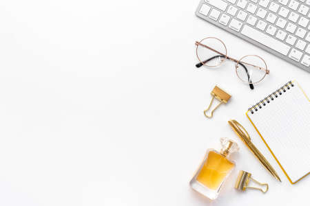 Home office desk with supplies and computer, top viewの写真素材