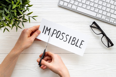 It is possible concept. Word Impossible becomes Possible with scissorsの写真素材