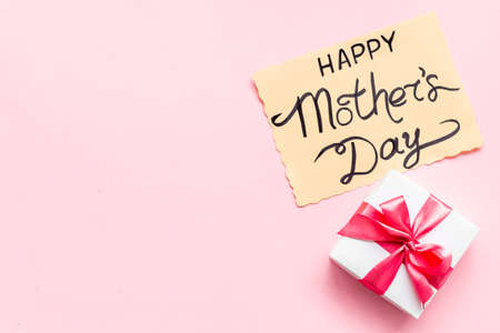 Women mothers day concept with pink ribbon fift boxの写真素材