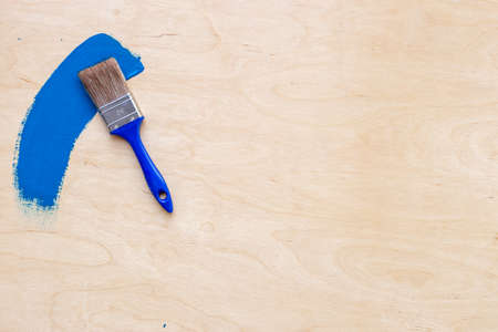 Paint brush with color for house renovation and wall paintingの写真素材
