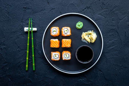 Japanese cuisine. Sushi roll set with salmon on dishの写真素材