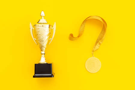 Gold medal first place and award trophy cup. Winner conceptの写真素材