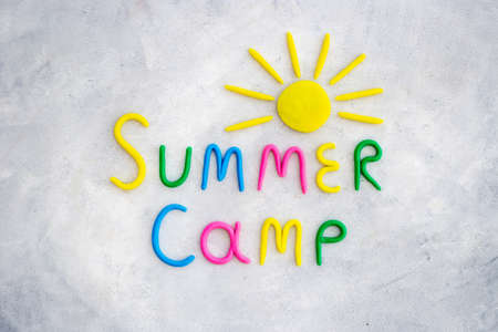 Summer Camp made of color clay with sun. Camping backgroundの写真素材