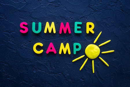 Camping concept. Color text Summer Camp with sunの写真素材