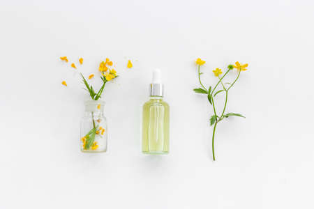 Healing herbal medicine products with wild herbs and flowersの写真素材