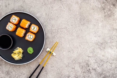 Sushi menu concept. Sushi roll set with salmon on dish