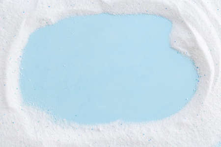 Laundry detergents powder background. Laundry day mockupの写真素材