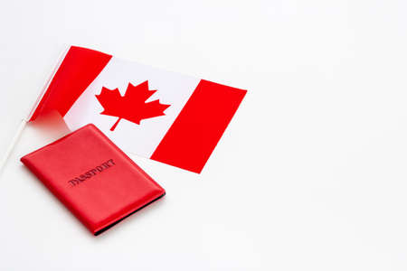 Flag of Canada with passport. Travel visa and citizenship conceptの写真素材