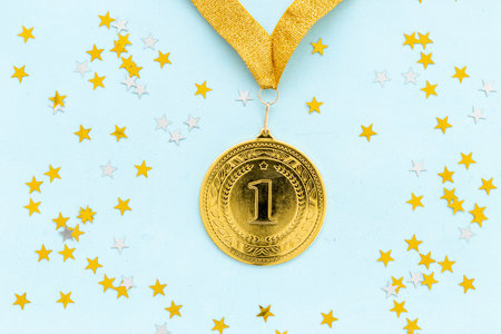 Gold medal first place on ribbon with stars. Winner conceptの写真素材