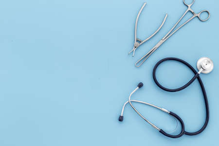 Dental or surgical steel instruments with stethoscope. Healthcare backgroundの写真素材