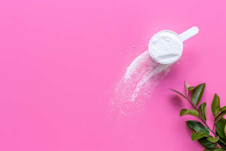 White washing powder with measuring scoop. Laundry day conceptの写真素材