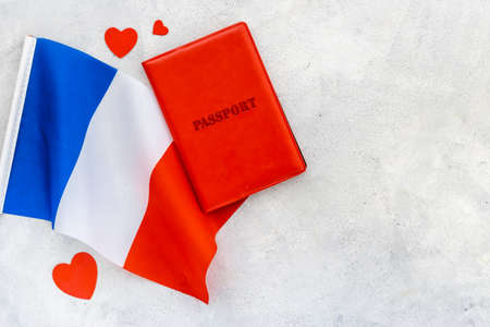 Flag of France with passport. Travel visa and citizenship conceptの写真素材