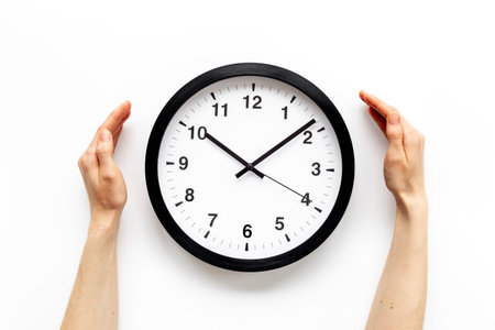 Time or deadline concept. Office wall clock with hands