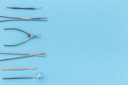 Flat lay of medical steel equipment tools for surgery or dentistryの写真素材