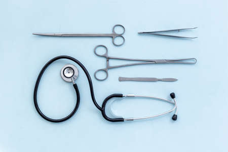Dental or surgical steel instruments with stethoscope. Healthcare backgroundの写真素材