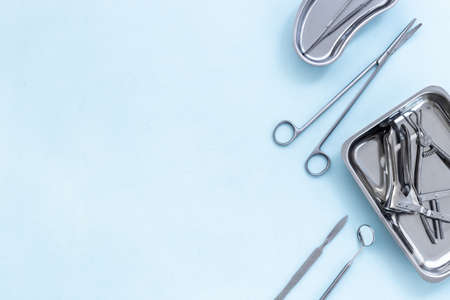 Dental or surgical instruments in steel tray at doctor deskの写真素材