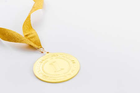 Winner and success concept with gold medal first place and ribbonの写真素材