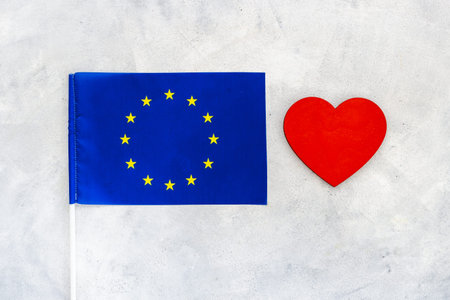 Flag of European Union with heart sign. Travel visa and citizenship concept