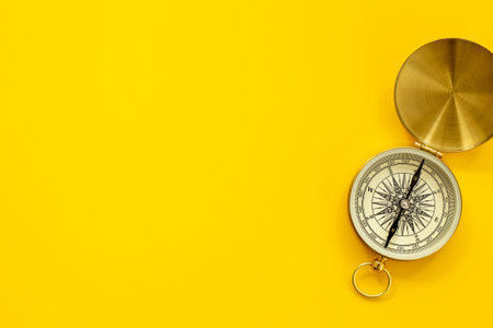 Golden vintag compass top view. Direction choice conceptの写真素材