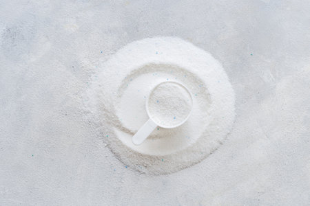 White washing powder with measuring cup. Laundry day conceptの写真素材