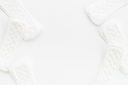 Female hygiene concept. White panty liners pattern, top viewの写真素材