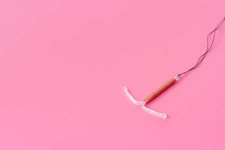 T-shaped intrauterine contraceptive device. Hormone free contraception conceptの写真素材